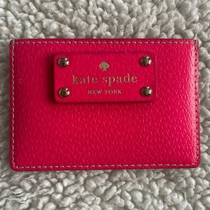 Hot pink Kate Spade card holder in great condition.